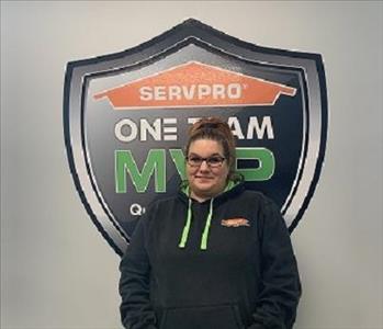 Smiling female SERVPRO employee in front of 